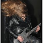 James McIlroy Playing Guitar and Headbanging