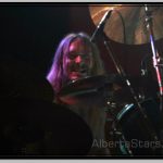 Grimace on Face of Steve Asheim WHile Playing Hard and Fast
