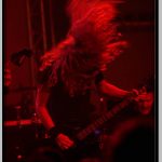 Derek Harn Headbanging While Playing Bass