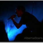 Silhouette of Ted Phelps on Stage in Edmonton