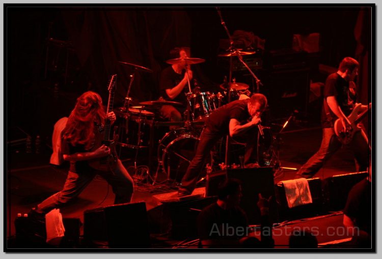 Members of All That Remains on Stage in Edmonton