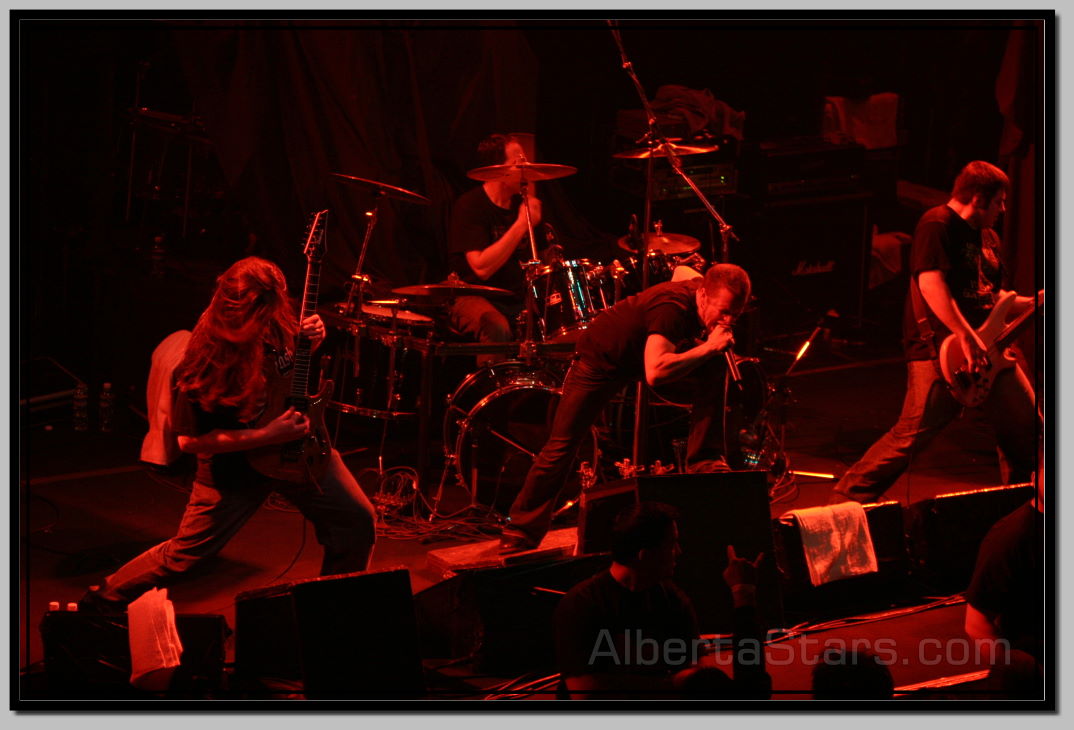 Members of All That Remains on Stage in Edmonton