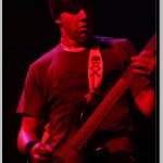 Bloodshoteye Bassist with Skull and Bones on Guitar Strap