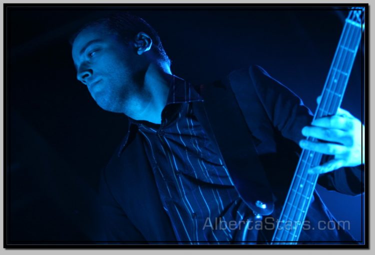 Chris Wolstenholme Under Bluish Greenish Light