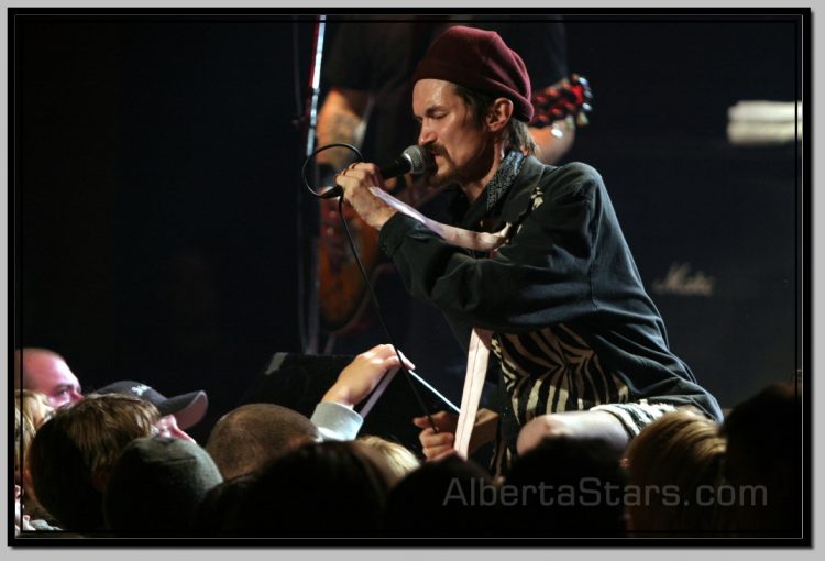 Mr. Chi Pig in His Trademark Proximity to Audience at Concerts