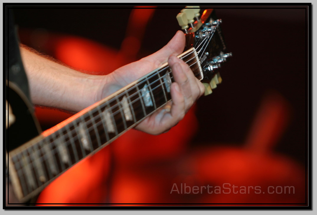 Closeup of Marc Belke Playing His Guitar